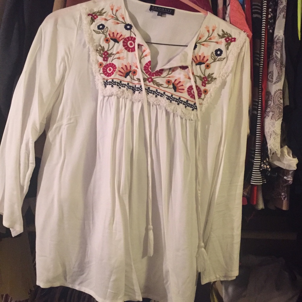 Cream with embroidered design